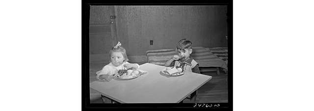 Photograph Titled: Latin-American child at lunch. Nursery school, FSA (Farm Security Administration) camp. Robstown, Texas