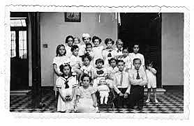 Her mother died and her father gave her brothers and sisters and her in adoption