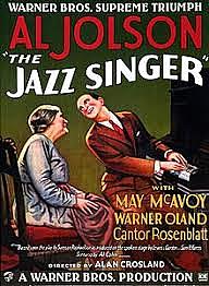 The Jazz Singer, the first "talkie" (motion picture with sound) is released