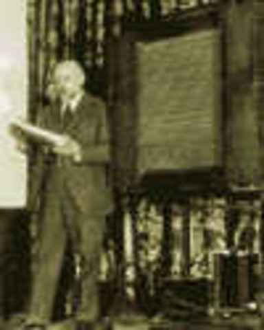 Pictures are first transmitted over telephone lines.