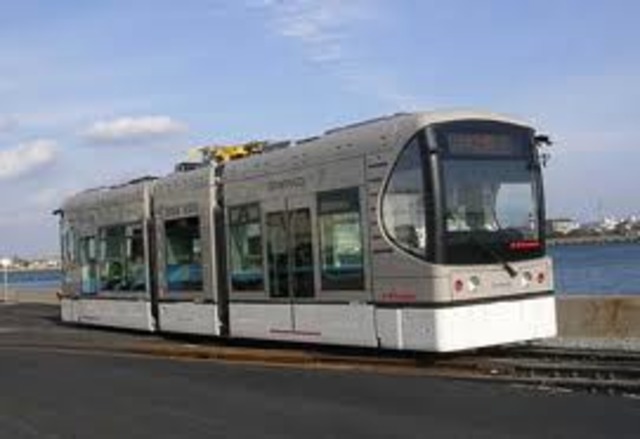 John Joseph Wright improves the electric streetcar