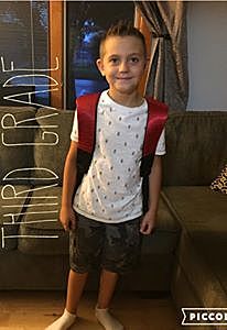 Asher started 3rd grade at a new school