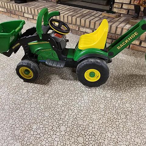 got a power wheels tractor