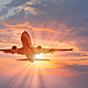 Plane in sunset shutterstock