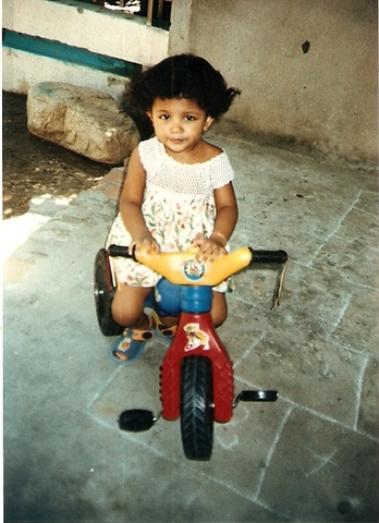 My godmother gave me my first tricycle