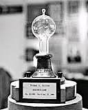 Edison perfects an incandescent light bulb