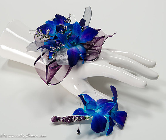 Buy corsages for both people at the flower shop in Eldridge