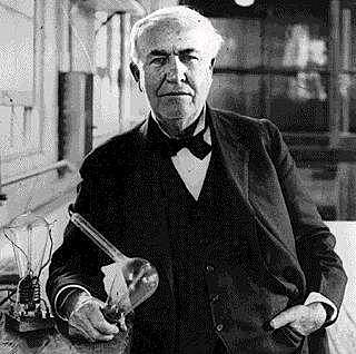 Edison perfects incandescent light bulb