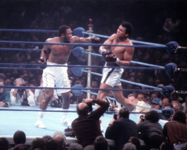 Muhammad Ali defeats Joe Frazier in a rematch fight