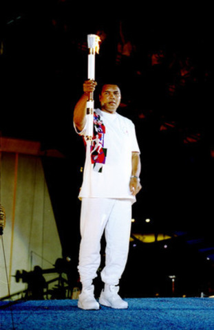 Muhammad Ali lights the flame at the 1996 Summer Olympics opening ceremony