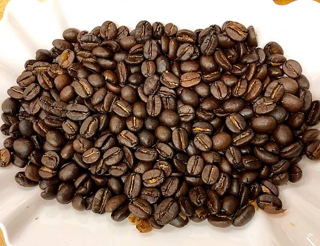 MONEDA MAS COMÚN  ERAN LOS GRANOS DE CAFÉ