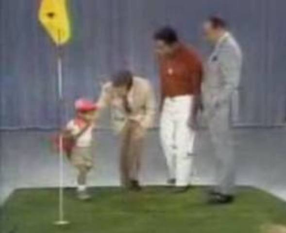 At age three, Tiger shoots a 48 at Navy Course.