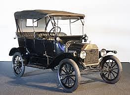 Henry Ford produced his first Model T (car)