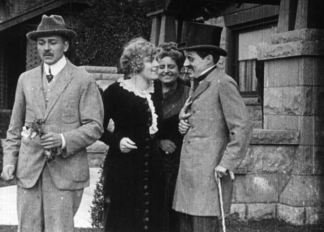 Charlie Chaplin made his first Film  "Making a Living"