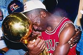 Michael Jordan & the Bulls win first championship and is awarded MVP.