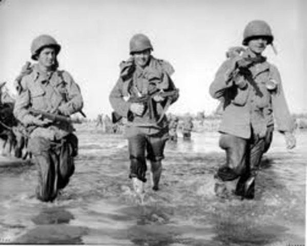 U.S. troops liberate Cherbourg, France.