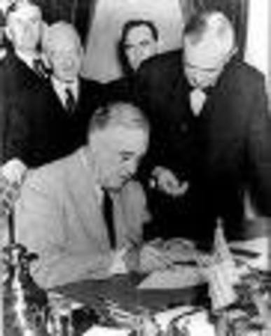 Roosevelt signs Lend-Lease Act
