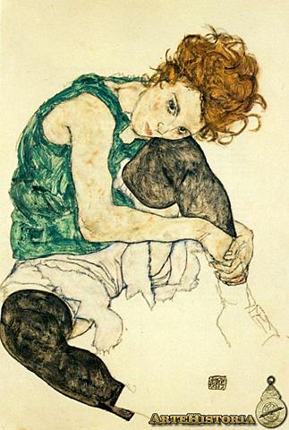 MUJER SENTADA CON SU RODILLA FLEXIONADA