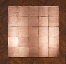 Carl Andre - 64 copper squares.