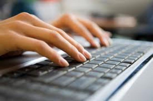 Zuckerberg begins writing Facebook.