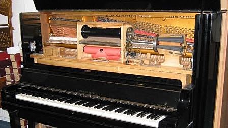 El disco de pianola con corneta