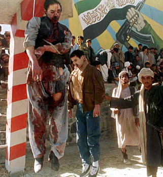 The Taliban publicly executes Najibullah.