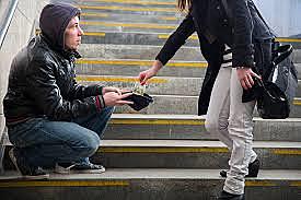 Frank in the street begging