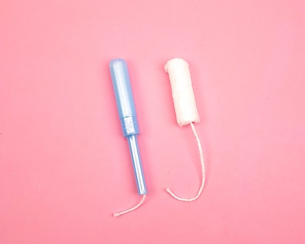 First tampon with applicators