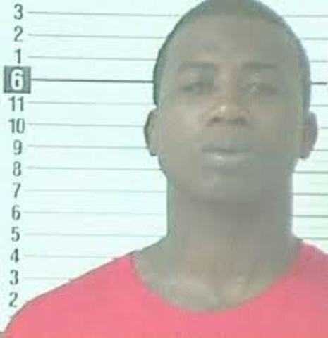 While serving a six-month jail term for assault , Davis was charged with murder, though the charges were later dropped due to a lack of evidence. In 2009, he served a year-long prison term for violating probation for his 2005 assault conviction.