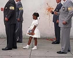 -First grader Ruby Bridges is the first African American to attend William Frantz Elementary School in New Orleans.