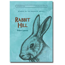 She writes her first book, "Rabbit," at age 6.