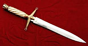 Macbeth Imagines a dagger in front of him.