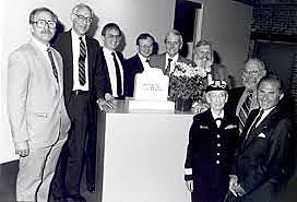 Participants in COBOL's 25th Anniversary Celebration at The Computer Museum on May 16, 1985, surround the COBOL Tombstone, a gift in 1960 from Howard Bromberg (far right) to the COBOL Committee.”  COBOL (Common Business-Oriented Language)