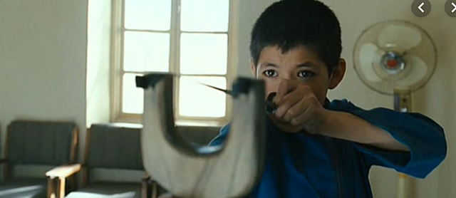 Amir fights Assef to protect Sohrab.