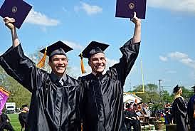 Amir graduates high school