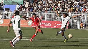 Hassan is at a soccer game and see Tabilban restrictions