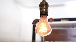 Thomas Edison brings light to the world with the light bulb