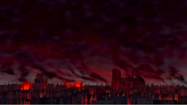 Many buildings in the city are on fire due to Frollo’s search for Esmeralda.