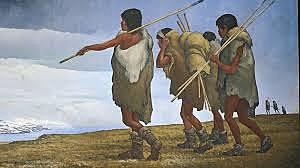 The first human beings arrive in Alaska