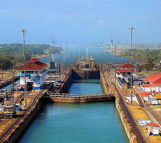 The Panama Canal is completed and opened for traffic