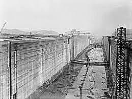 The Panama Canal is completed and opened for traffic