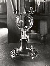 Thomas Edison brings light to the world with the light bulb