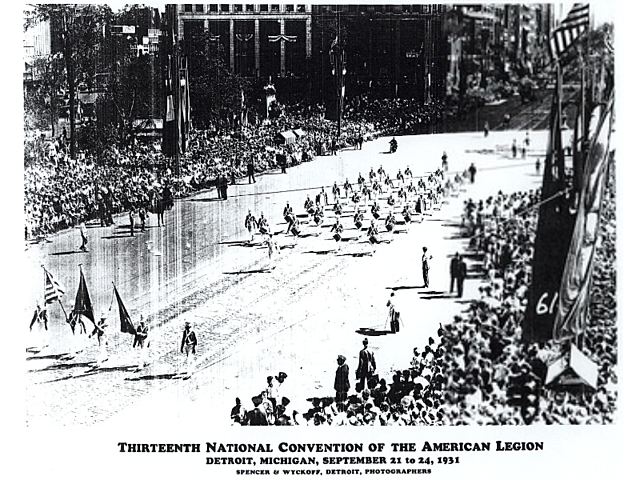 Photocopy of photograph of a military band marching in a parade, 13th National Convention of the American Legion, Detroit, Michigan