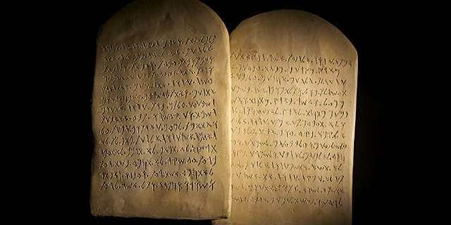 Moses meets God at Mt. Sinai and Israel receives the Laws (10 Commandments)