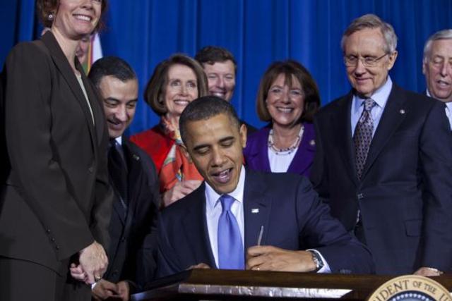 Obama signs legistation repealing DADT