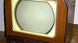 Timeline: Television 1941- is a machine with a screen. Televisions receive broadcasting signals and change them into pictures and sound