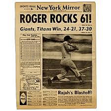 Roger Maris of the Yankees breaks Babe Ruth's single season home run record