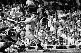 Roger Maris of the Yankees breaks Babe Ruth's single season home run record