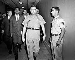 Boxer Muhammad Ali refuses military service