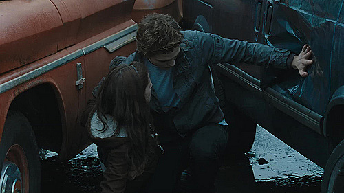 Edward saves Bella for being hit by a car.